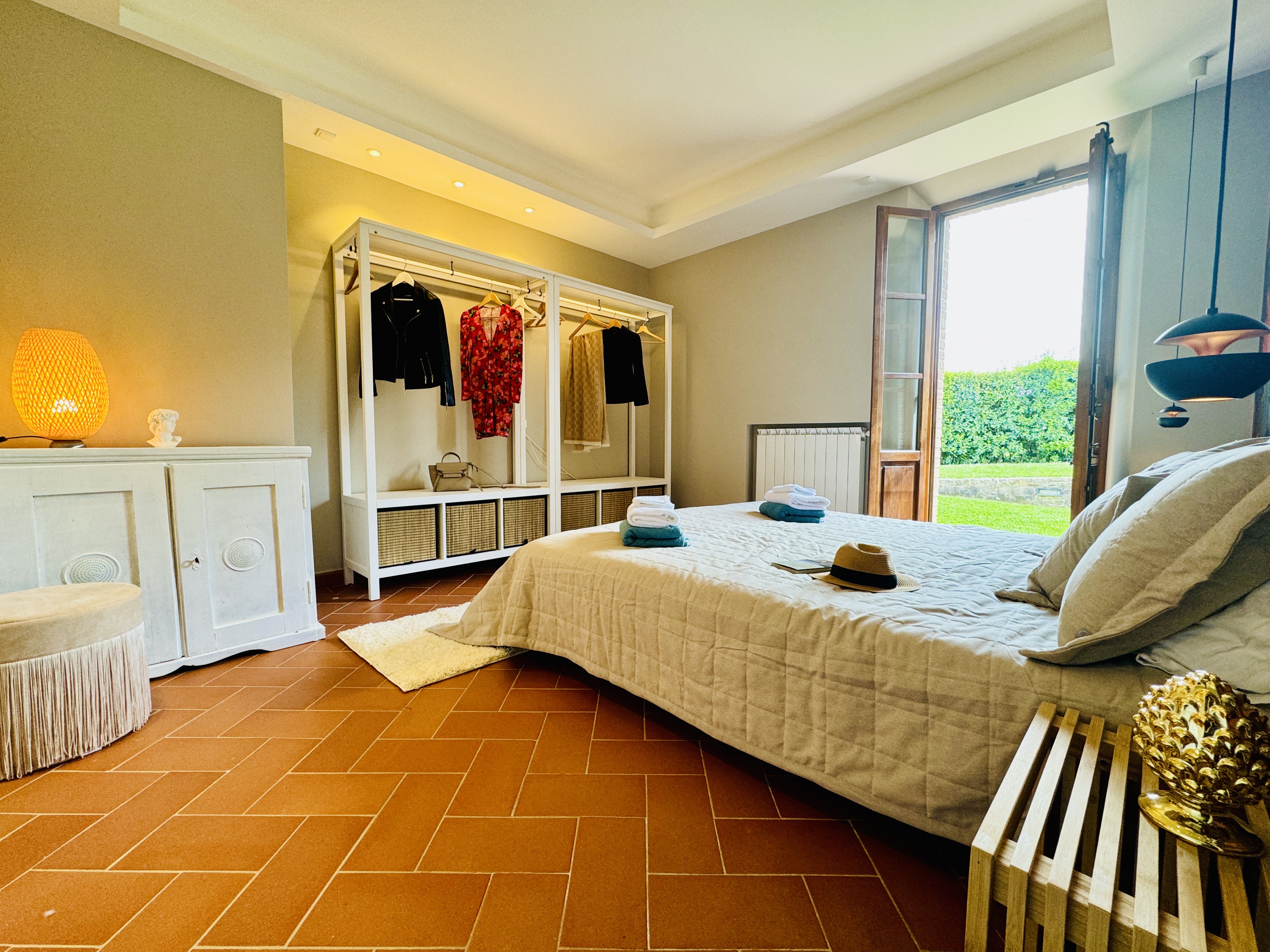 Master Bedroom 2 with ocean-inspired wallpaper