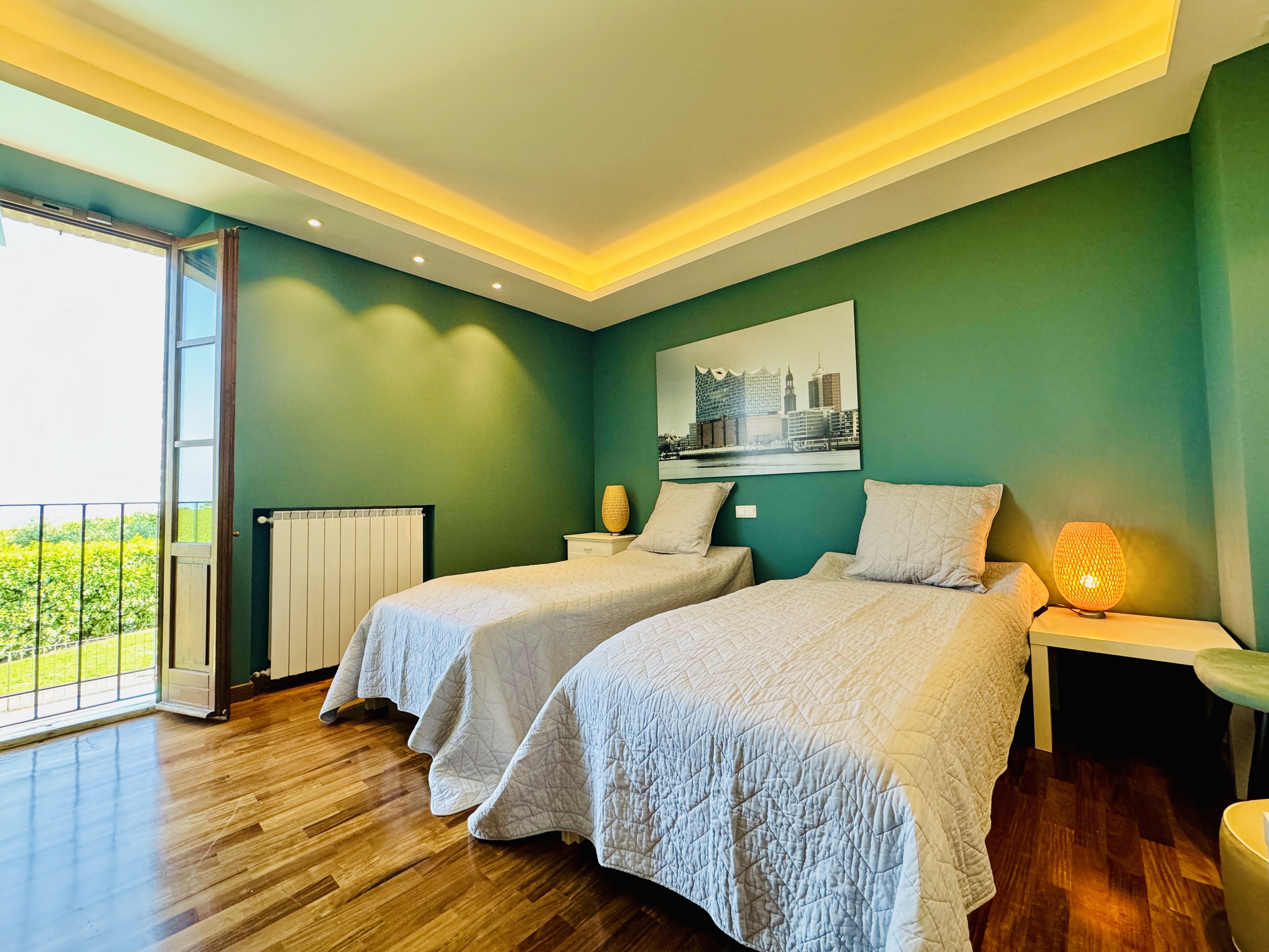 Bedroom 4 with twin beds and terrace access