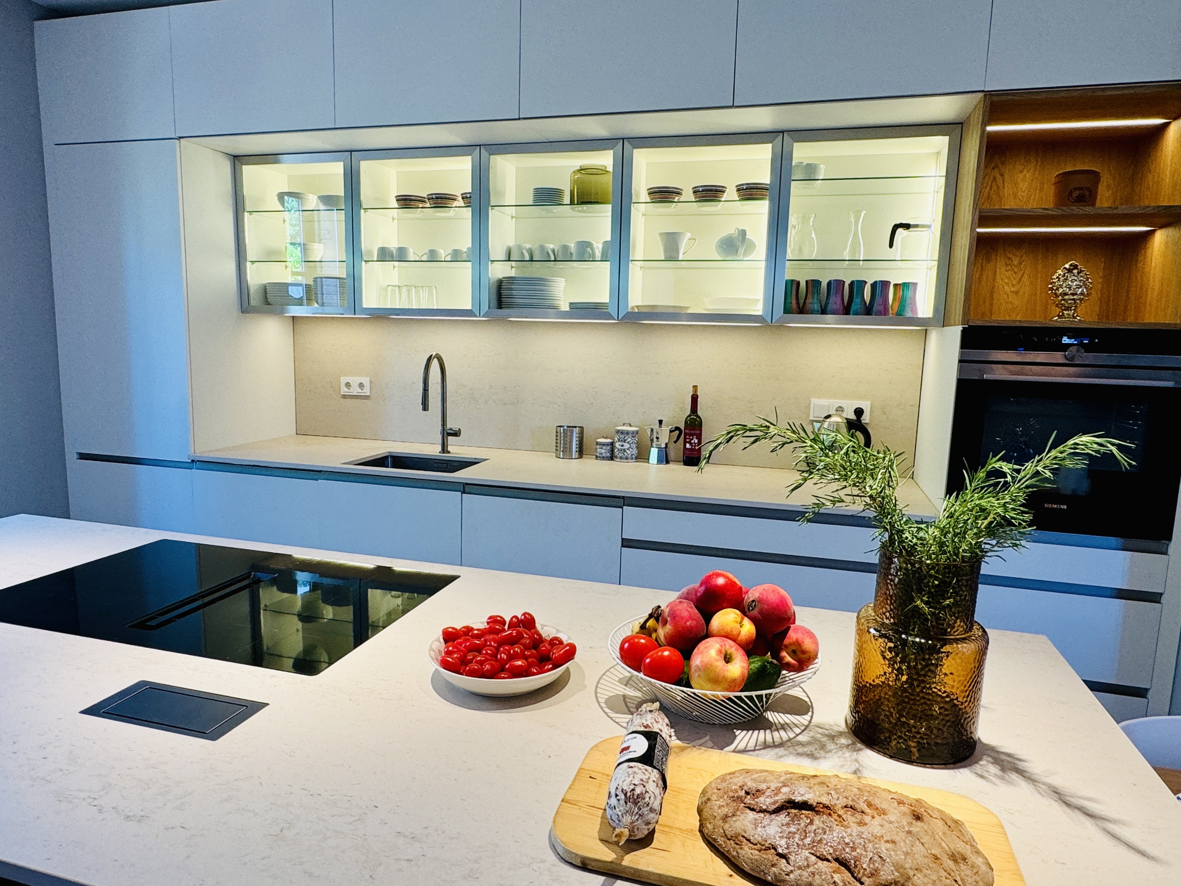 Kitchen with illuminated wall units