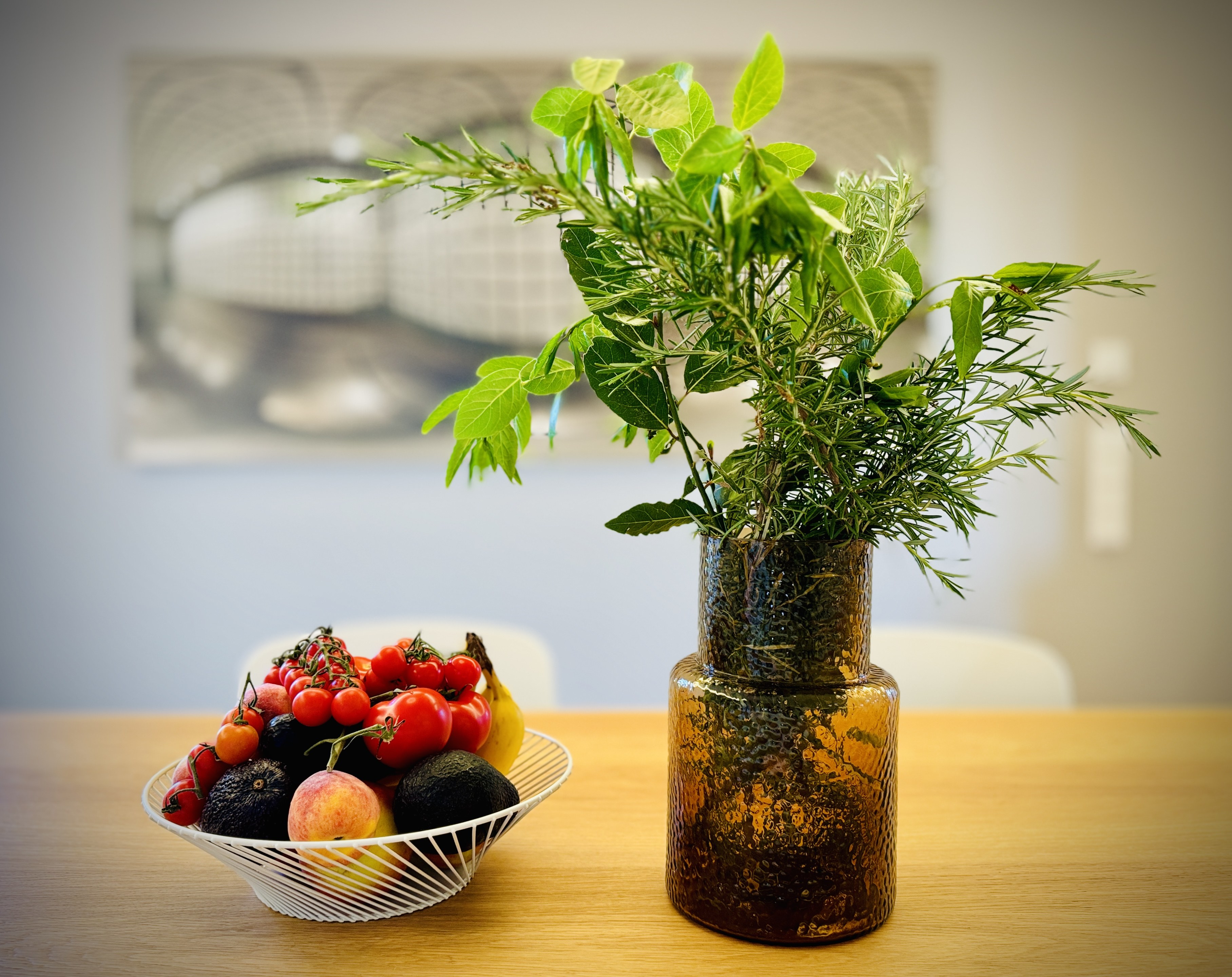 Kitchen with fresh herbs and fruit bowl