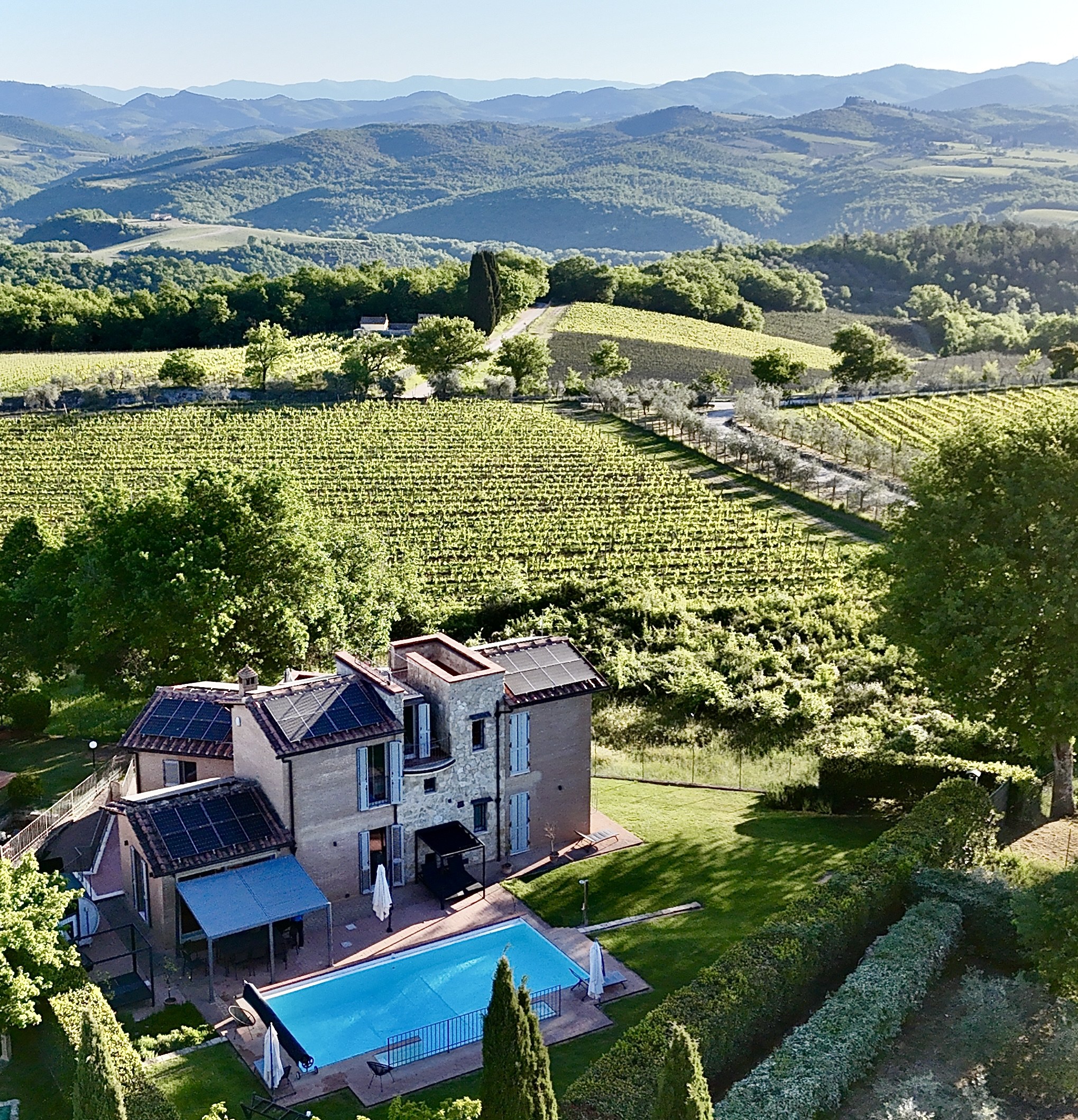 Aerial view of Libertas Tuscan Hideaway villa and Chianti Classico vineyards