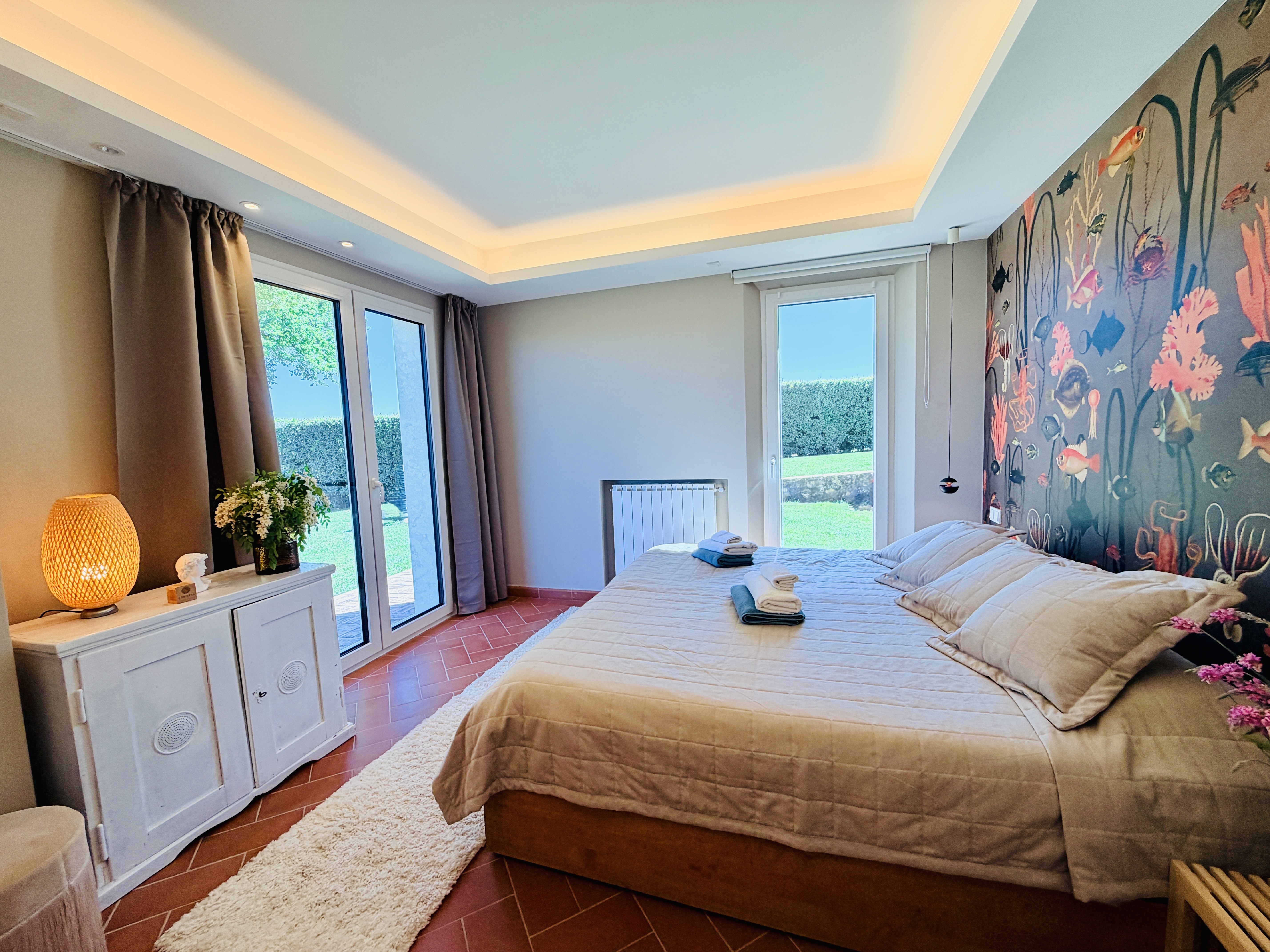 Master Bedroom 2 with two windows and garden view