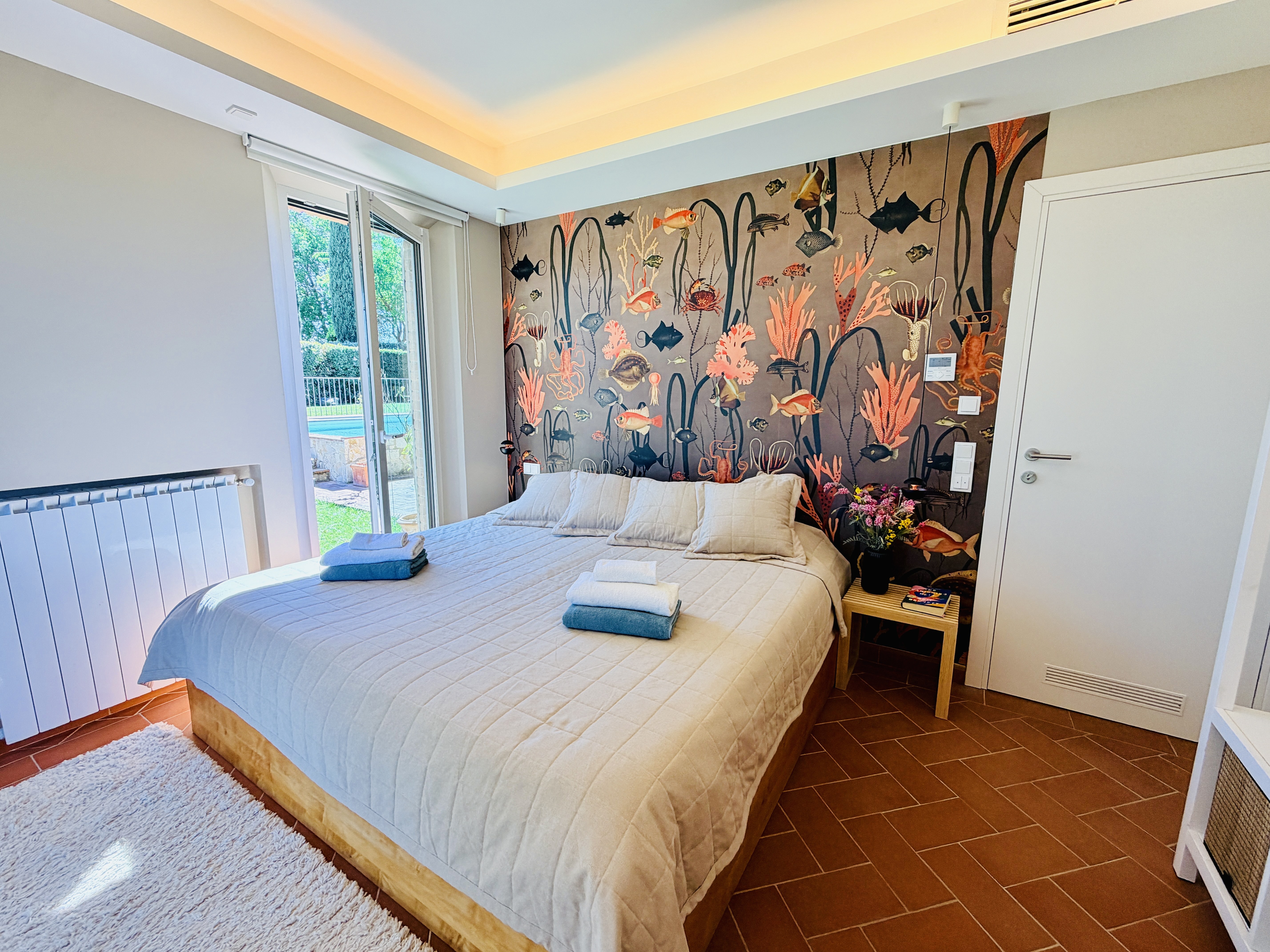 Master Bedroom 2 with ocean mural wallpaper