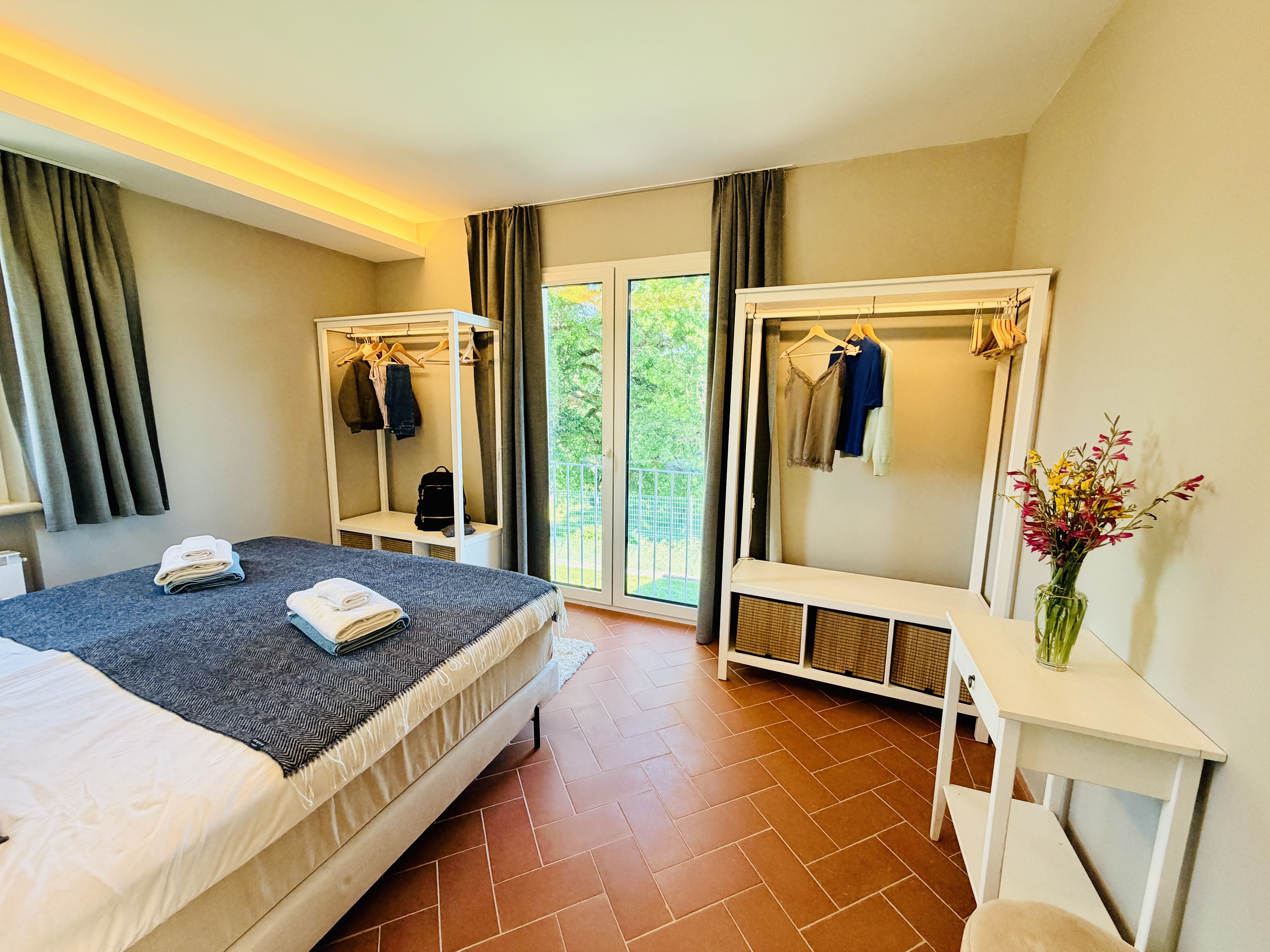 Master Bedroom 3 with open wardrobe and terrace access