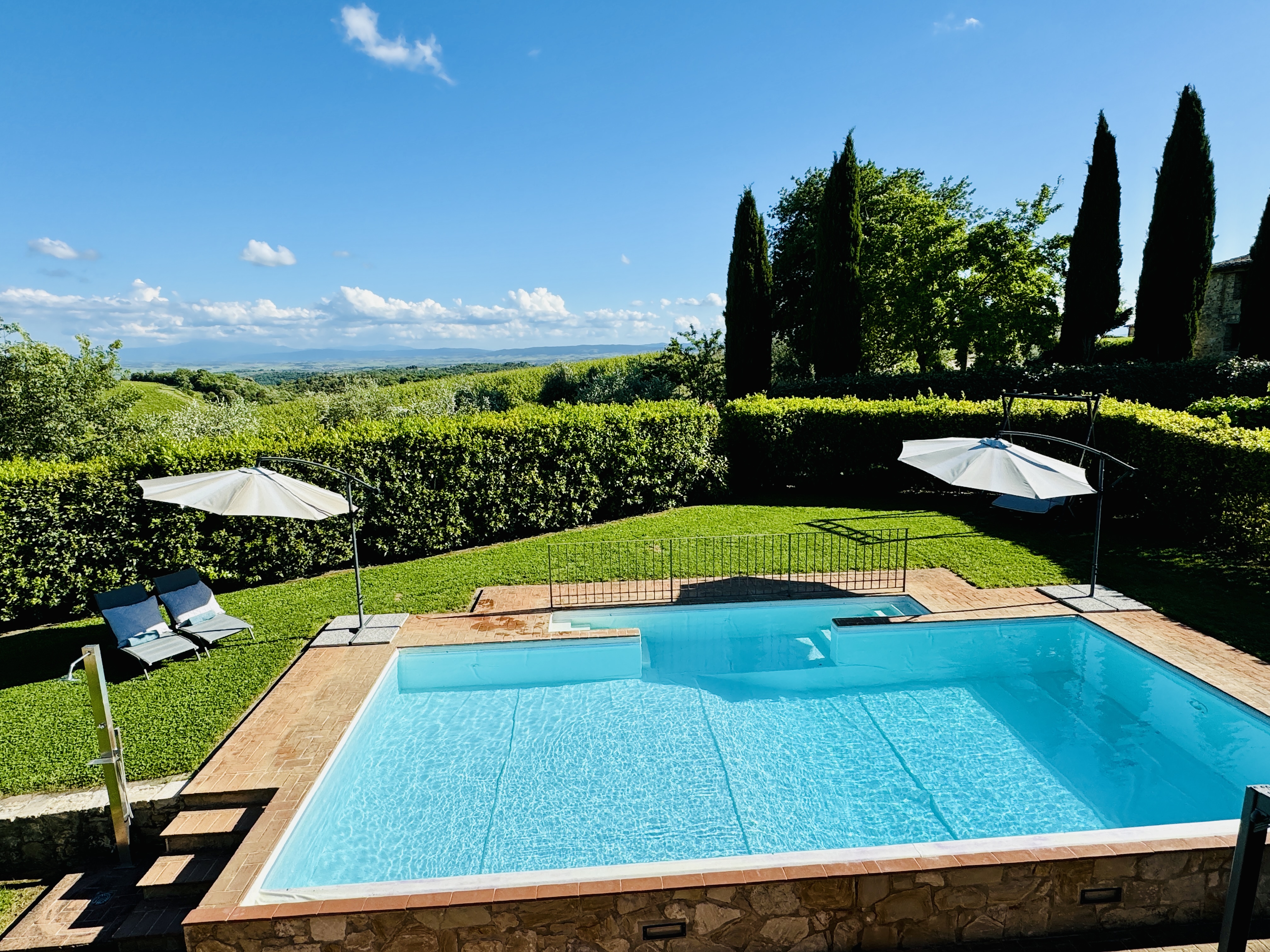 Private pool with panoramic views over Chianti Classico vineyards