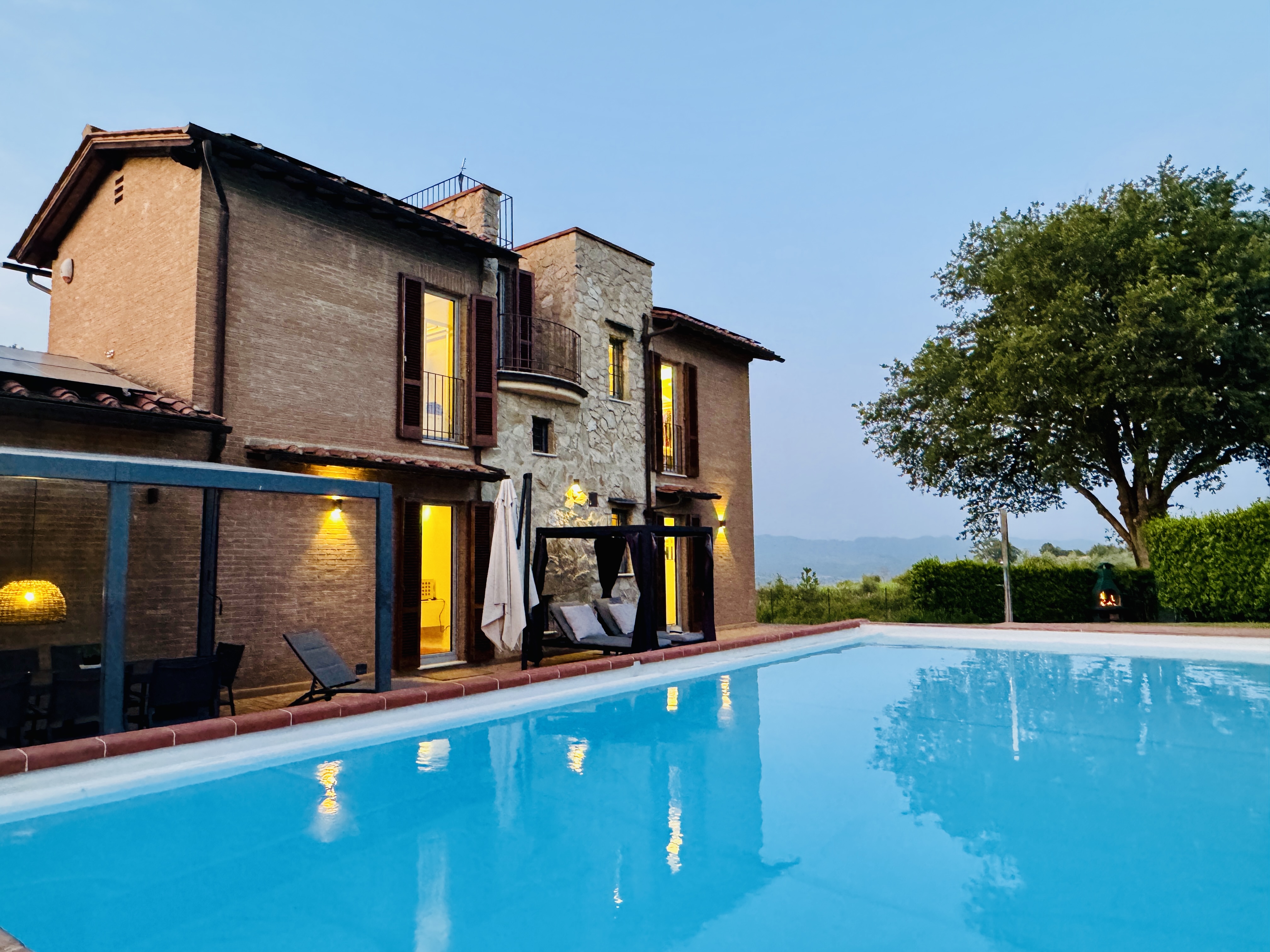 Villa and pool at dusk